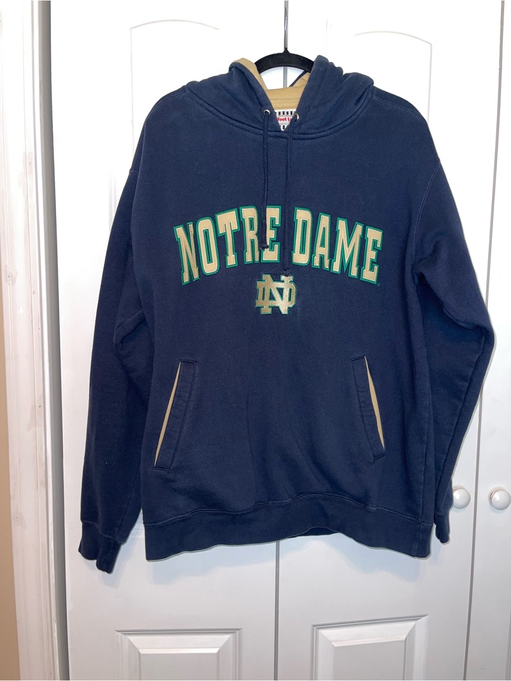 Notre Dame Navy Pullover Hoodie with Green and Gold Logo